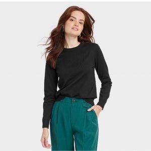 A new day black crewneck sweater, size large, never worn